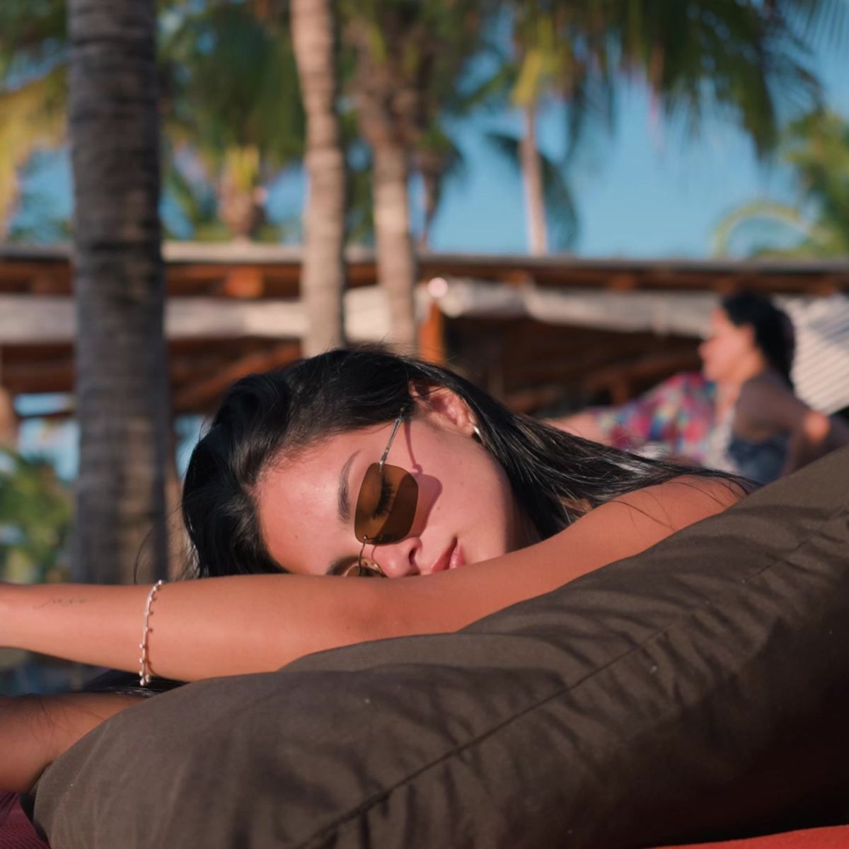 Resting on a beach bed